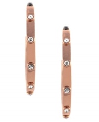 Stunning and sparkling. These open hoop earrings from Vince Camuto are crafted from polished rose gold-tone mixed metal with crystal accents adorning the outside for added luster. The earrings feature a post with friction-back closure. Approximate drop: 1-3/4 inches.