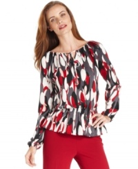 Ellen Tracy's peasant top features a big bold print that instantly wakes up casual days.