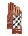 Burberry marries its classic check print with leather and suede for stunningly chic, belted gloves.