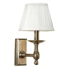 A great way to light up any room, this wall sconce is fashioned after old work lamps.