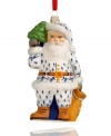 Filled with the charm of Christmas past, this Vaillancourt Santa Claus ornament is hand painted in a blue and white suit and trimmed in shimmering green and white glitter.