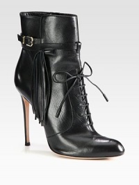 Channel biker-chic vibes wearing this leather ankle boot, with fringe detailing and an adjustable buckle strap. Self-covered heel, 4 (100mm)Leather upper with adjustable buckle strapLeather lining and solePadded insoleMade in Italy