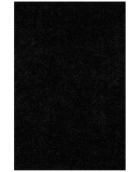 Add rich, shimmering black texture to any modern room with the Metallic area rug from Dalyn. Hand-tufted of soft polyester, this high-luster shag area rug puts comfort and fun back in floor decor.