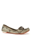 Snakeskin printed leather lends an exotic feel to a practical yet oh-so-stylish moccasin shoe from Luxury Rebel.