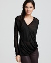 Soft draping lends a relaxed, feminine feel to this Kain Label asymmetric tee.