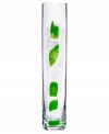 Like blades of grass, this Kosta Boda bud vase is straight, tall and full of life. A column of clear art glass streaked with texture and vivid green punctuates a room with modern artistry. Designed by Anna Ehrner.