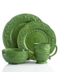 Raised florals, scrolls and lattice detail in the style of Fitz and Floyd's Ricamo dinnerware grace these forest-green place settings with traditional charm. Pair with multicolored pieces to put your own spin on casual country dining.