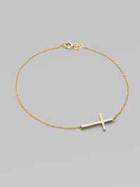 A gleaming 14k gold cross on a delicate chain.14k yellow gold Length, about 7 Pendant length, about ¾ Spring ring clasp Made in USA