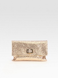 A cocktail essential covered in glittery fabric with a turnlock clasp and rich suede lining.Turnlock flap closureOne inside open pocketSuede lining9W X 6½H X 1/2DImported