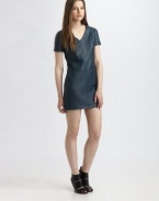 Backed by soft cotton paneling, this trend-forward leather dress has a v-neck, slash pockets and ultra-short silhouette. V-neckShort sleevesSlash pocketsInvisible back zipperAbout 18 from natural waistFront: Leather; Back: CottonDry clean with leather specialistImportedModel shown is 5'10 (177cm) wearing US size 2.