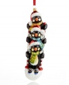 Three adventure-seeking penguins hit the slopes, sharing just two ski poles in this whimsical ornament from Kurt Adler. Featuring hand-painted Polonaise glass for extra holiday brilliance.