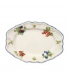 The Cottage Inn oval platter is a colorful addition to the sophisticated table. Lush, dancing clusters of ripened blueberries, raspberries and cherries are a stunning contrast on creamy white porcelain and lend every meal a touch of traditional elegance.