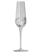 Equal parts modern splendor and classic beauty, the Equinox grande flute from Reed & Barton enhances formal tables with impeccable crystal shine. A rounded bowl encircled with deep faceted cuts reflects light from the sun, chandelier or candles on a slender, simply elegant stem.