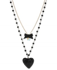 Show your love for the dark side. Betsey Johnson's two-row pendant features a black heart with black-colored crystal accents, black bow with round-cut crystal accents and gold tone chain with black faceted beads. Crafted in antiqued gold tone mixed metal. Approximate length: 16 inches + 3-inch extender. Approximate drop: 3-1/2 inches.