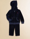 This coordinating athletic set includes a classic full-zip hoodie and a matching sweatpant in soft, cozy velour. Hoodie Attached hoodLong sleevesFull-zip frontSplit kangaroo pocketRibbed cuffs and hem Sweatpants Elasticized waist with tieMock fly87% cotton/13% polyesterMachine washImported