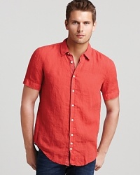 Color adds dimension to your casual cool look with this dapper short-sleeve button-down, featuring a slim-fitting silhouette for modern appeal.