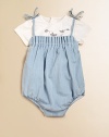 A sweet and stylish little one-piece with a pleated bodice and shoulder ties.SquareneckSleeveless with shoulder tiesBack zipperPleated bodice98% cotton/2% elastaneMachine washImported