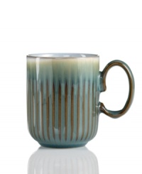 A rustic glaze, textured feel and rounded base make Denby's fluted mug a stylish go-to for cocoa, coffee and soup. Ultra-sturdy stoneware heats and reheats easily for everyday, anytime use.