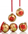 Watch your holiday bloom with elegant Martha Stewart Collection Christmas ornaments. Matte gold glass painted with shiny poinsettia and holly fills the tree with timeless grace.