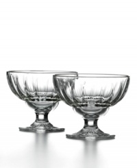 Get a taste of vintage elegance with Gourmet Elise ice cream bowls from French Home. A footed design in luminous, gently fluted glass is the cherry on top of your favorite sundae.