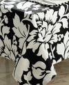 Pair this bold floral napkin with other Black and White table linens to enhance colorful meals at home. (Clearance)