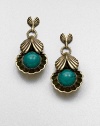 A Hellenic-inspired design that features a stunning turquoise cabochon set in antique-finished brass. TurquoiseAntique-finished brassDrop, about 2.25Post backImported 