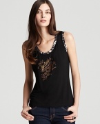 This black BASLER tank takes to a hint of jungle print and a dash of sequins for a tempered take on this season's safari craze.