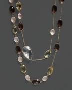 A mix of colorful quartz and clear crystal stations on a 14K yellow gold chain.