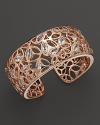 Clear rock crystal rests inside gleaming 18K rose gold on this modern Di MODOLO cuff.