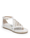 THE LOOKDiamond shape of interlaced leather straps and metal ringsAdjustable ankle strap with buckleEspadrille details at solePadded insoleTHE MATERIALLeather upperLeather liningRubber soleORIGINImported