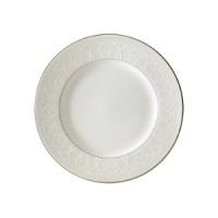 Like icing on a wedding cake, the Ballet Icing Collection elicits both awe and admiration as it captures the graceful elements and sweeping orchestrations of dance. The delicate piping of the pattern evokes the craft of a master cake decorator forming circular spirals in white on our newest fine bone china patterns.