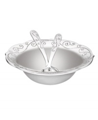 With a feminine edge and pretty perforated detail, the French Perle salad bowl from Lenox's collection of serveware and serving dishes holds fresh greens or pasta with decidedly vintage charm. In pure aluminum with matching servers, it's a brilliant complement to French Perle dinnerware. (Clearance)