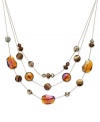 Layer on luxe loveliness with this three-row necklace from Style&co. Bronze and gold glass stones illuminate your look. Crafted in gold tone mixed metal. Approximate length: 18 inches + 2-inch extender.