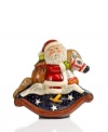 Dressed in traditional red coat and hat, this modern-day Santa sits upon a toy rocking horse with his bag of presents, ready to deliver to all the anxious children. Shaped in an antique chocolate mold, this figurine is then hand painted for one-of-a-kind character. From Vaillancourt.