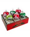 This set of signature flocked ornaments by Christopher Radko is filled with classic Christmas elegance. Each Shiny Brite ball features a unique frosty scene, from skiing snowmen to Santa's sleigh, in shades of green and red.