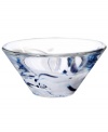 A dramatic accent, this Tempera bowl features heavy glass laced with hand-painted swirls of black, white and blue. Designed by Anna Ehrner for Kosta Boda.