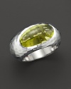 Faceted lemon quartz set in a sculpted sterling silver band. By Roberto Coin.