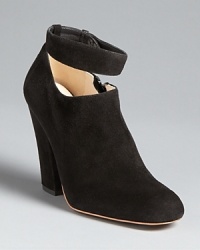 These chic Chloé booties work two ways: wear them with the strap with skirts or strapless with skinnies.