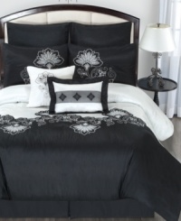 A dramatic black and white palette gives this Esme comforter set a chic and sophisticated look. Embellished with a modern floral pattern, striped accents and a lustrous sheen, these set makes a full impact in the bedroom.