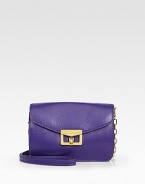 EXCLUSIVELY AT SAKS in Royal Purple. Smooth leather crafted in a petite flap silhouette, finished with a versatile leather and chain shoulder strap.Detachable shoulder strap, 22 dropTurnlock flap closureSix inside card slotsFully lined7½W X 4H X 1½DImported