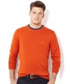 Pop some color into your layered look with this orange crew neck sweater from Nautica.