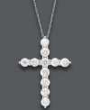 Symbolic sparkle makes the perfect gift. This stunning cross pendant offers a luminous look with its round-cut diamond decor (2 ct. t.w.). Crafted in 14k white gold. Approximate length: 18 inches. Approximate drop: 1-1/10 inches.