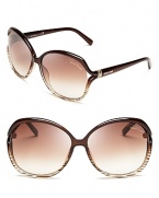 Fashionista-favorite oversized shades get a style upgrade from chic striped frames and glam gradient lenses; from Roberto Cavalli.