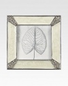 Masterful enameling has the look of lustrous mother-of-pearl in this elegant square frame with Swarovski crystals shimmering at each corner.Enamel and crystalWhite bronze finishHandmade, hand-enameled and hand-set2.75 square; holds a 2 square photoImported