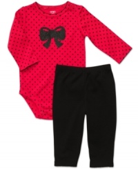 Wrap her up just like the gift that she is in this playful polka-dot bodysuit and pant set from Carter's.