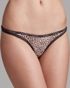 Calvin Klein Underwear's printed thong features intricate lace trim and a logo-stamped waistband.