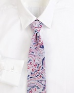 An artful paisley pattern distinguishes this fine Italian silk tie. About 3 wideSilkDry cleanMade in Italy