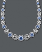 Dazzle them with an array of sparkle! Arabella's stunning collar necklace features round-cut blue Swarovski zirconias (25-1/3 ct. t.w.) and round-cut white zirconias (30-1/2 ct. t.w.) set in sterling silver. Approximate length: 17 inches.