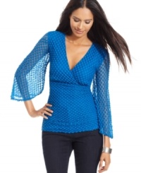 Style&co.'s latest top is perfect for date night with a stunning silhouette, dot motif and dramatic sheer bell sleeves.