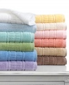 Daily showers become a sumptuous treat with Martha Stewart Collection's Plush bath sheet. Featuring ultra-absorbent and fast-drying cotton embellished with a bold, tufted dobby. Choose from a spectrum of cheerful hues.